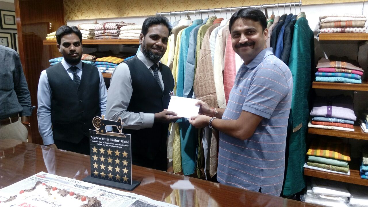 Raymond celebrates tailors