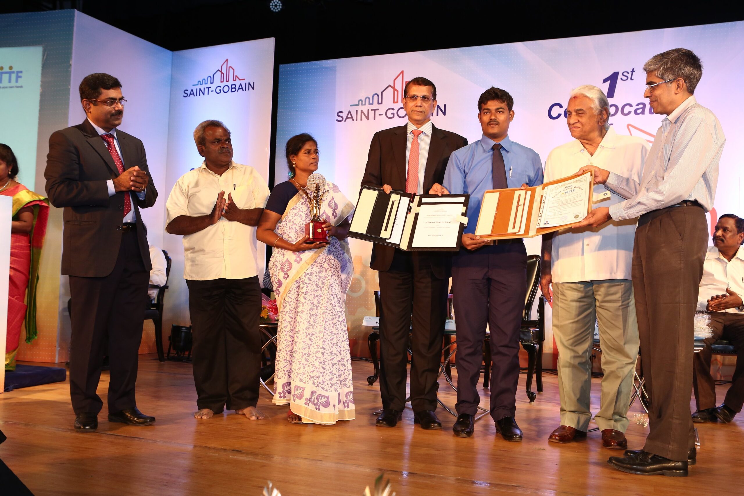 Saint_gobain_lwe_student_receiving_the_diploma_completion__certificate_during_convocation